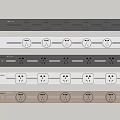Neatly Arranged Electrical Socket Panels In Different Colors With Multiple Outlets