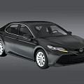 Black Toyota Camry Sedan Featuring Sleek Exterior Design And Modern Headlights