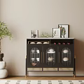 Elegant Black Sideboard With Glass Doors Decorative Vases Picture Frames Green Plant And Stone Decor