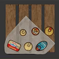 Assorted Canned Food Items Arranged on Wooden Tray with White Cloth