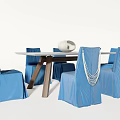 Dining Table Set With Blue Chair Covers White Tassel Decor And Wooden Frame