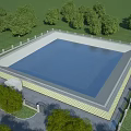 Industrial Factory Water Storage Facility With Metal Railing And Green Trees Background