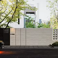 Modern Stone Building Exterior Wall With Black Gate Number 5-803 And Surrounding Trees Greenery