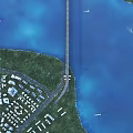 Aerial Planning of Coastal Area With Bridge Residential Community and Green Spaces