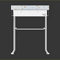 Portable Baby Changing Table With White Metal Frame And Colorful Patterned Pad