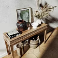 Elegant Console Table in Sunlit Interior With Textured Wall Dried Pampas Vase and Picture Frame