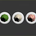 Three Colored Ice Cream Cones Green Beige Pink White Swirl On White Bases Dark Background