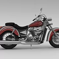 Classic Motorcycle Design With Red Body Black Leather Seat Chrome Exhaust And Spoked Wheels