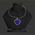 Stylish Blue Pendant Necklace With Silver Chain On Black Mannequin
