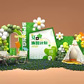 Spring Themed Photo Check In Spot with Green Decorations Flowers Balloons Tent and Tables Chairs