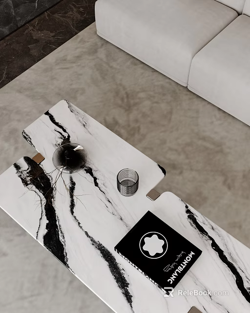 Modern Black And White Marble Coffee Table With Decorative Item And Adjacent Sofa 3d model 