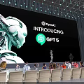 OpenAI Introducing GPT15 Event Featuring Robot Head Display And Audience On Stage