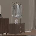 Modern Metal Frame Clothes Hanger with Hanging Clothes and Wooden Cabinet White Bag on Top
