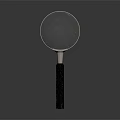 Vintage Magnifying Glass With Metal Frame And Black Handle On Dark Background