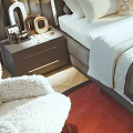 Double Bed with Headboard Decor Nightstand Lamp and Sofa in Bright Bedroom with Window