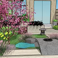 Rockery Stones In Modern Garden Landscaping With Green Plants And Water Features