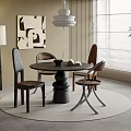 Modern Restaurant Dining Area With Round Black Table Stylish Chairs Abstract Painting And Pendant Light
