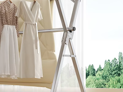 Sturdy Stainless Steel X Shaped Clothes Rack With Hanging Dresses Near Window And Green Plants 3d model