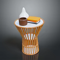 Bamboo Round Side Table With White Conical Vase Brown Mug And Yellow Books