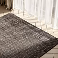 Gray Square Rug With Geometric Pattern On Light Tiled Floor In Natural Light Near Curtains