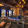 Stylish Industrial Bar Interior With Pendant Lights Bar Counter Seating Area And City View