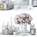 Stylish Modern Bathroom Accessories With Scented Sticks Skincare Bottles And Pink Peonies