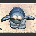 Blue Cookie Monster Plush Doll With Big Eyes Open Arms Sitting On White Mat