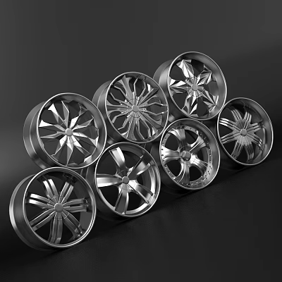 Silver Car Wheels With Various Spoke Patterns Arranged On Black Surface 3d model