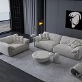 Modern Living Room Beige Sofa And Round Coffee Table Set With Rug And Fireplace
