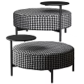 Round design ottoman with black and white houndstooth pattern and small round table 3d model