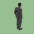 Man in Black Uniform Standing with Hands Behind Back and Badge on Gray Background