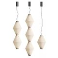 Three Diamond Shaped Cream Colored Fabric Pendant Lights Stacked Two Layers With Black Wires