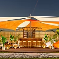 Orange And White Canopy Tent With Outdoor Bar Counter Plants And Chairs On Wooden Deck
