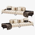 Modern Beige Sectional Sofa With Plush Cushions And Dark Throw Blanket 3d model
