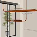 Modern Gold Curved Metal Chandelier With Mesh Shade In Interior Space With Plant