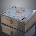 Vintage Metal Box with Engraved Letters Decorative Emblem and Lock Clasp