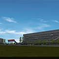 Modern Office Building with Glass Facade Surrounded by Open Green Lawn and Trees