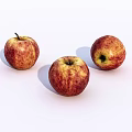 Three Ripe Red Apples with Yellow Spots Isolated on White Background