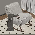Wooden Rocking Chair With White Cushion And Brown Blanket On Checkered Rug