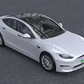 White Tesla Model S Sedan With Streamlined Body Black Roof And Modern Alloy Wheels