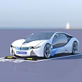 BMW Streamlined Electric Car Parked In Branded Parking Spot With White Body Blue Accents