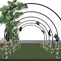 Decorative Event Entrance with Arched Structure Green Plants Fresh Flowers and String Lights