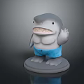 Game Movie Character With Shark Head Muscular Body In Blue Shorts Waving Hand 3D Designed