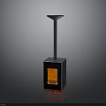 Black Square Base Industrial Equipment With Orange Glowing Element And Conical Top