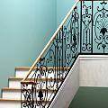 Staircase With Wrought Iron Decorative Railing And Wooden Steps Light Blue Wall Pink Floor