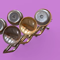Vintage Brass Musical Instruments in Gold Silver Bronze Tones Display on Purple Background