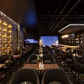 Modern JOHOBUS Bar Interior With Seats And Liquor Shelves