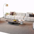 Modern Sofa Set With Coffee Tables Light Cushions Floor Lamp And Striped Rug
