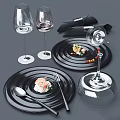 Elegant Dinnerware Set With Black Plates Transparent Wine Glasses And Metal Cutlery For Food Presentation