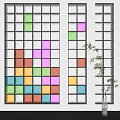 Vibrant Glass Wall with Colorful Square Patterns and Bamboo Plant Accent